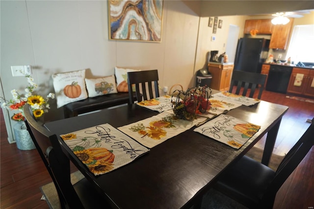 dining area featuring dark hardwood / wood-style floors