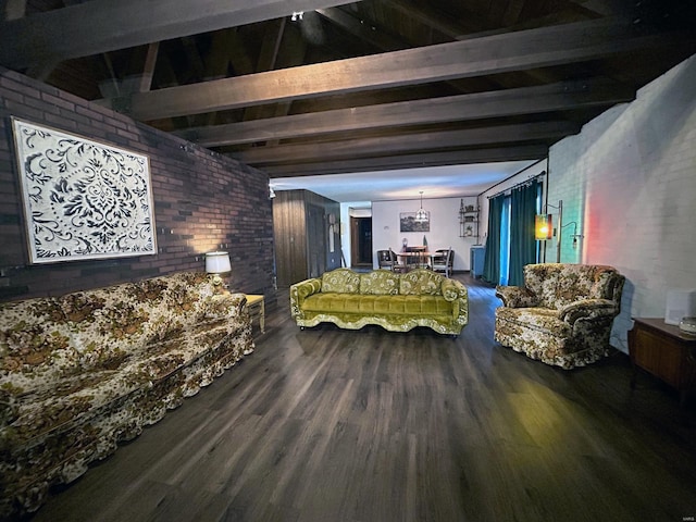 interior space featuring wood-type flooring, brick wall, and beam ceiling