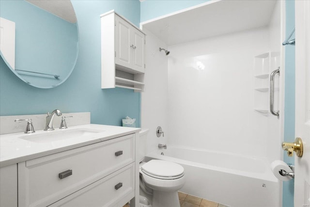 full bathroom featuring vanity, washtub / shower combination, and toilet