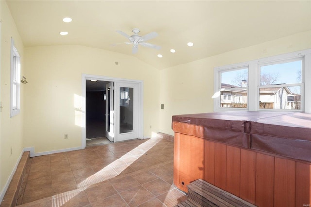 kitchen with recessed lighting, baseboards, lofted ceiling, and tile patterned flooring