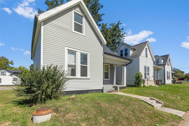 view of property exterior featuring a yard