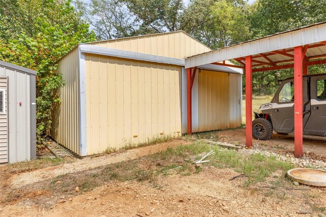 view of outdoor structure featuring a carport