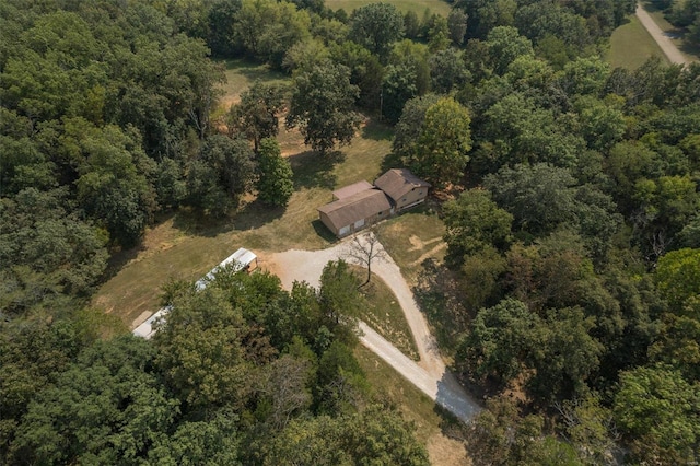 aerial view featuring a wooded view