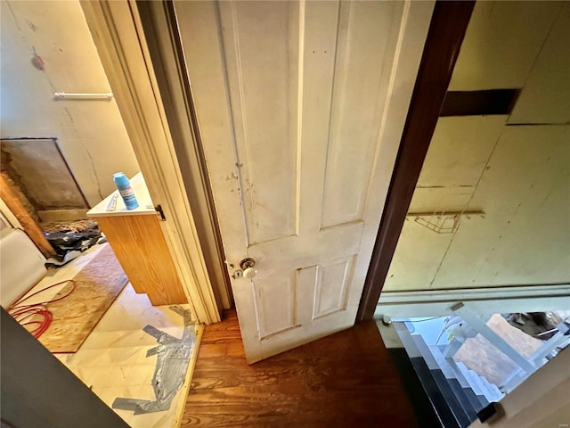 interior details featuring hardwood / wood-style flooring