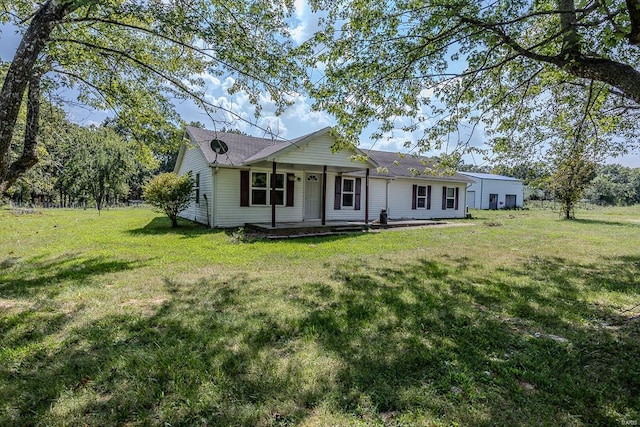 single story home with a front yard