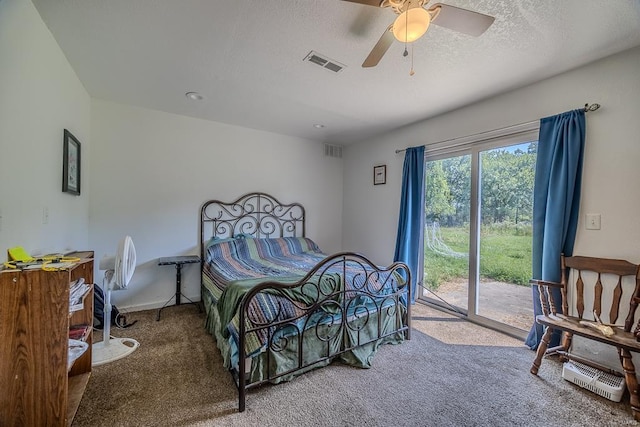 carpeted bedroom with a textured ceiling, access to outside, and ceiling fan