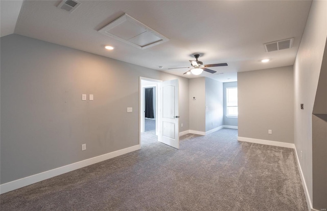 unfurnished room with carpet floors, ceiling fan, and vaulted ceiling