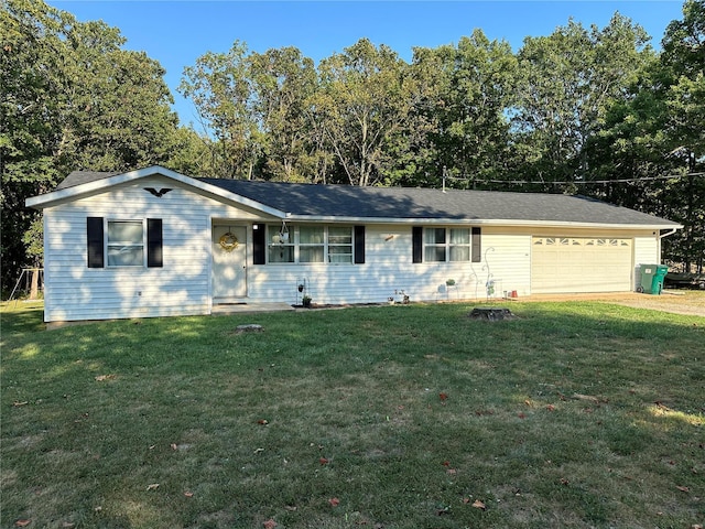 ranch-style house with a garage and a front lawn