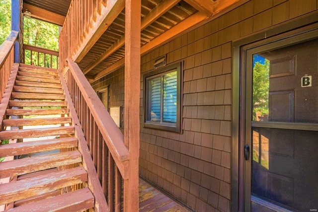 entrance to property with a wooden deck