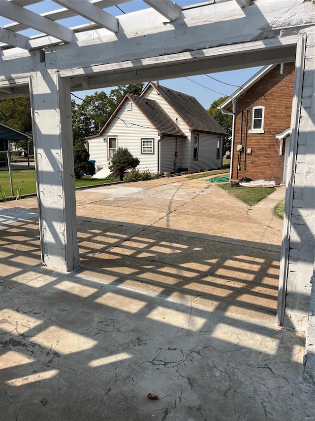 exterior space with a pergola