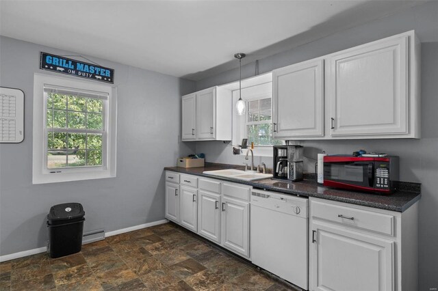 kitchen with dishwasher, decorative light fixtures, sink, and white cabinets