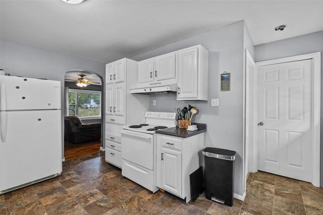 kitchen featuring ceiling fan, white appliances, and white cabinetry