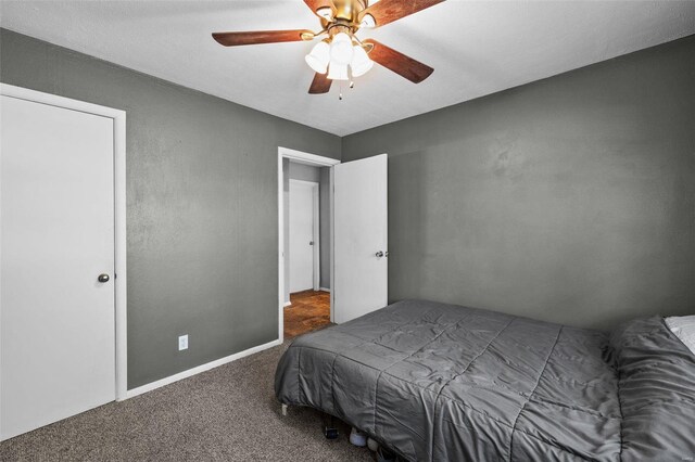 bedroom featuring carpet and ceiling fan