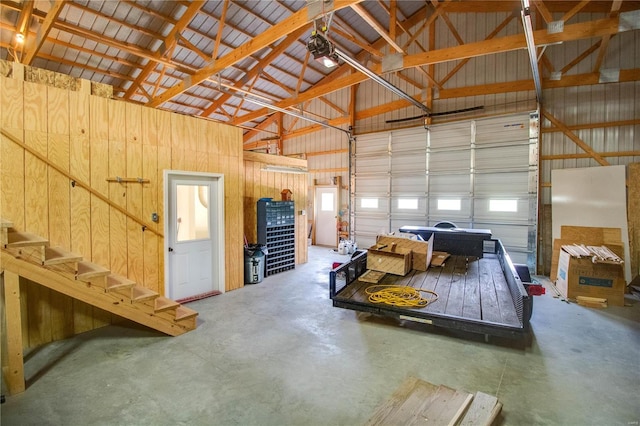 garage featuring wood walls