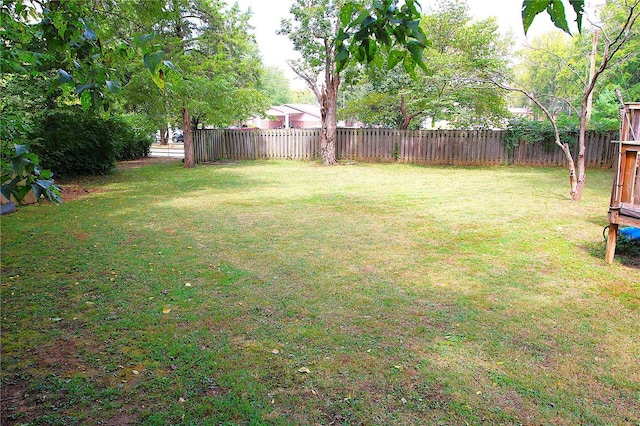 view of yard with fence