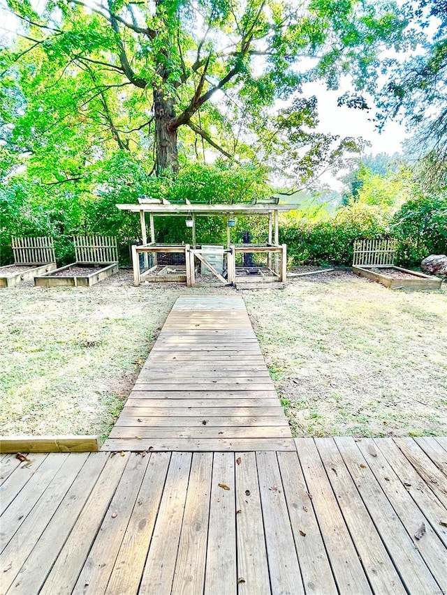 wooden deck featuring fence