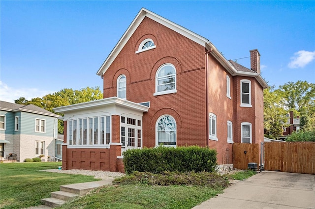 view of front of home with a front yard