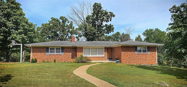 single story home with a front yard