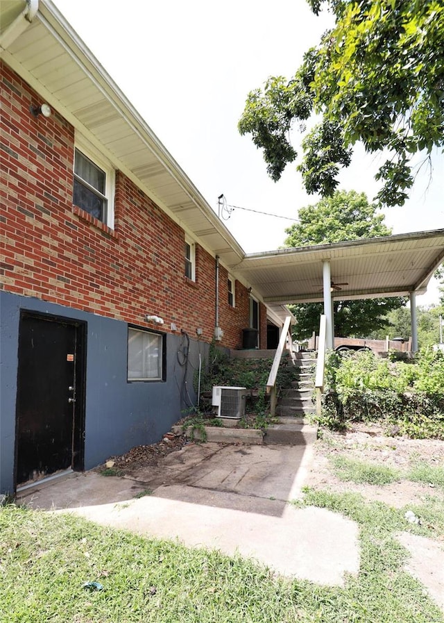 exterior space featuring central air condition unit