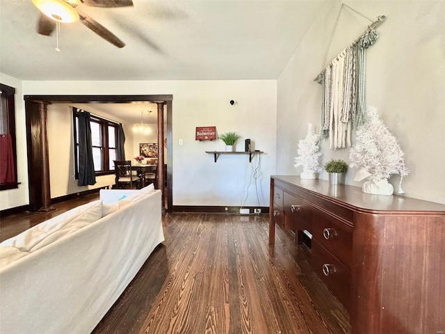 bedroom with dark hardwood / wood-style floors and ceiling fan