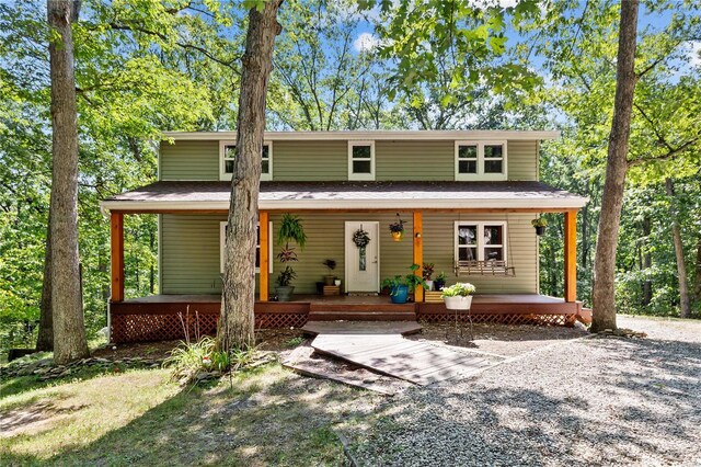 view of front property featuring covered porch