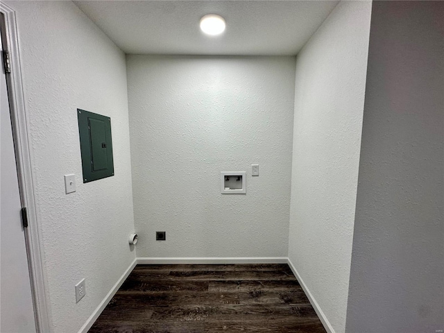 laundry area with electric panel, washer hookup, and dark hardwood / wood-style floors