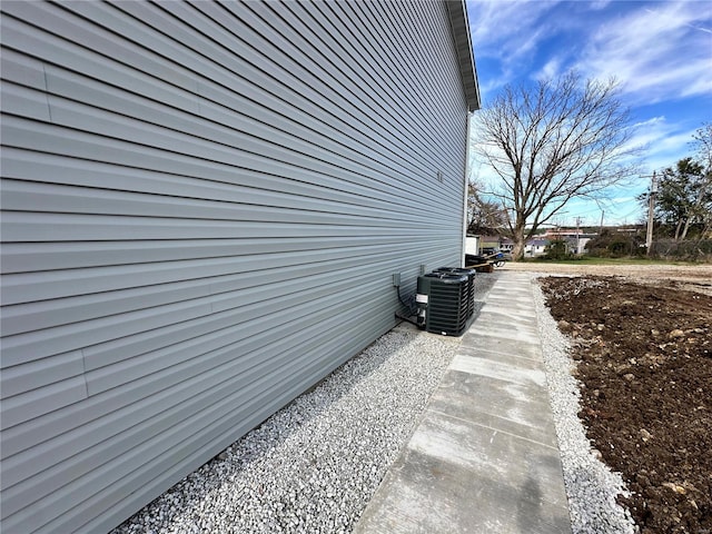 view of home's exterior featuring central AC unit