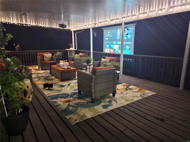 wooden deck with outdoor lounge area