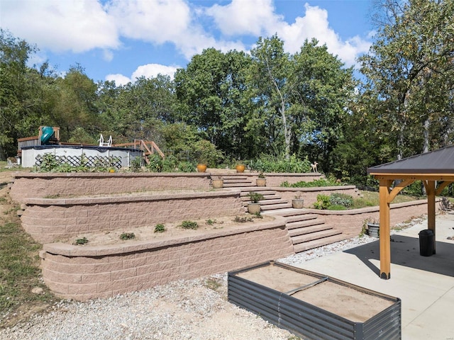 view of home's community with a patio area and a gazebo