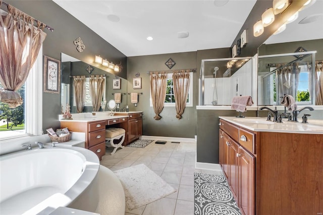 bathroom with a stall shower, two vanities, a sink, tile patterned flooring, and a bath