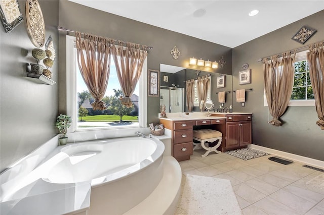 full bathroom with visible vents, tile patterned flooring, vanity, a shower stall, and a bath