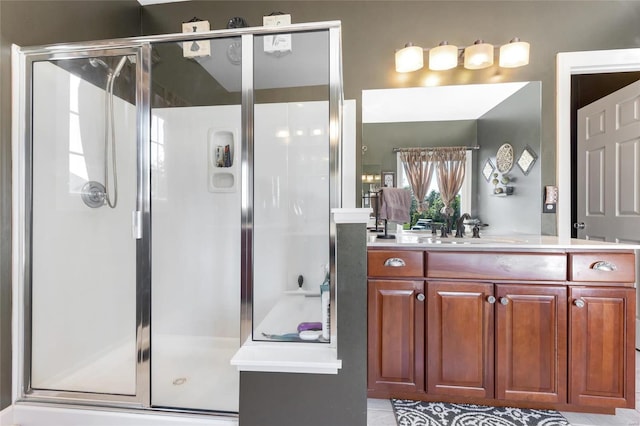 full bath with a shower stall and vanity