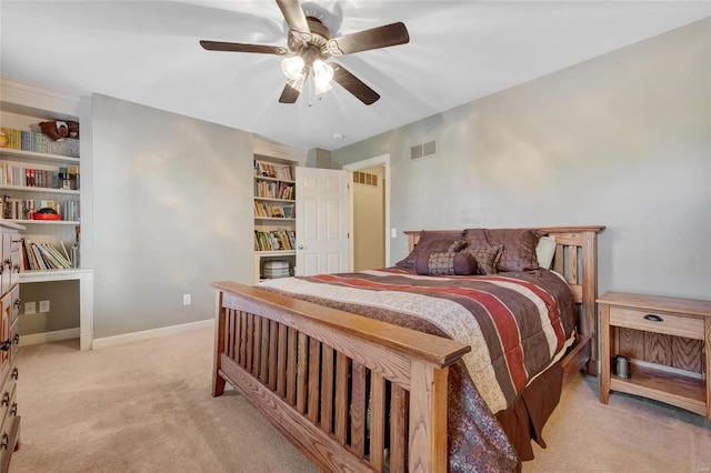 bedroom with ceiling fan, carpet, visible vents, and baseboards