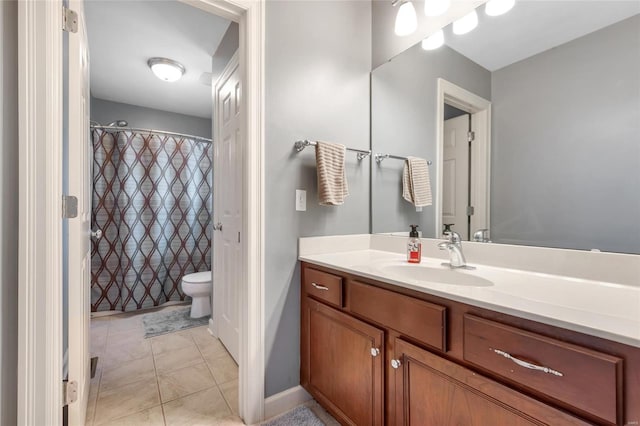 full bathroom featuring curtained shower, vanity, toilet, and tile patterned floors