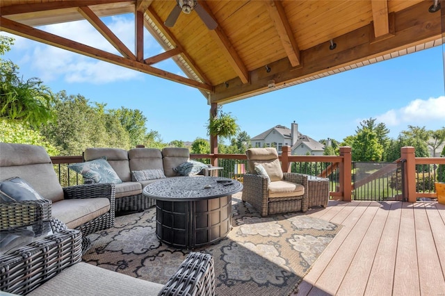 wooden deck with outdoor lounge area