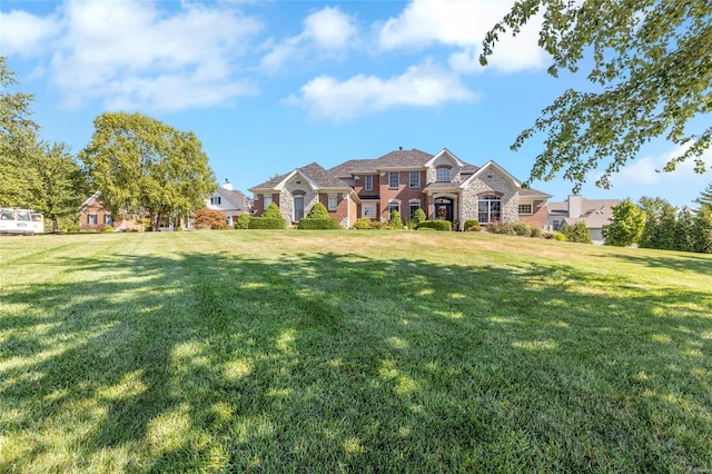 view of front of home with a front yard