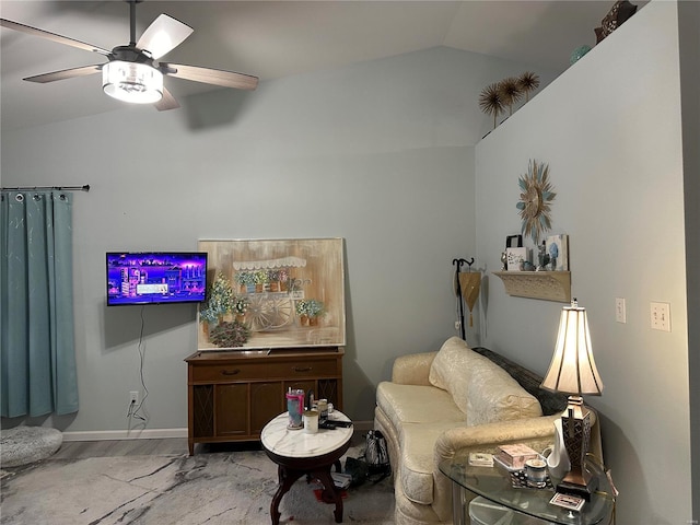 sitting room featuring baseboards, a ceiling fan, lofted ceiling, and wood finished floors
