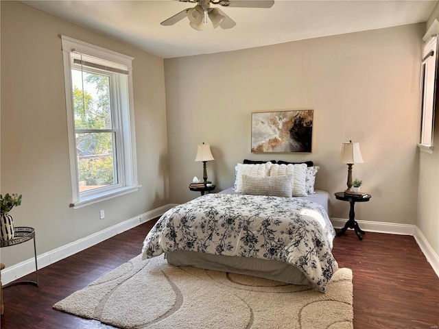 bedroom featuring dark hardwood / wood-style flooring and ceiling fan