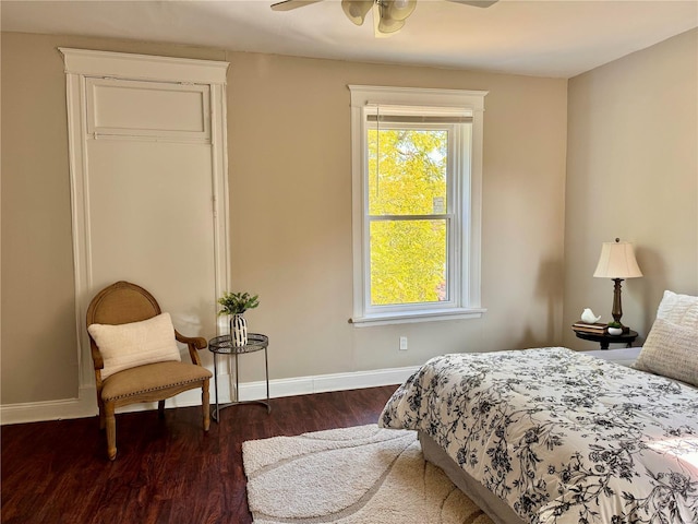 bedroom featuring dark hardwood / wood-style floors and ceiling fan