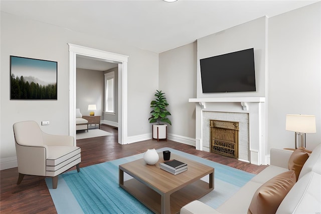 living room with dark hardwood / wood-style floors