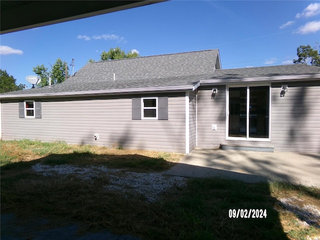 back of house featuring a patio