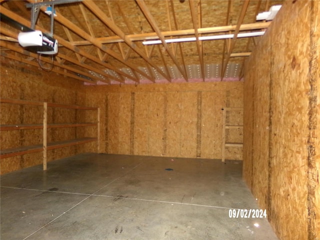 garage featuring a garage door opener