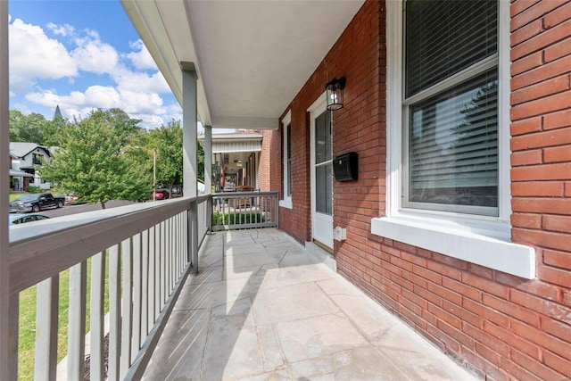 balcony featuring a porch