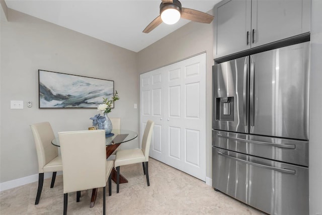 dining space with ceiling fan