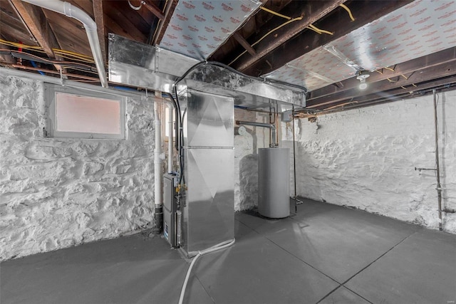 basement with gas water heater and heating unit