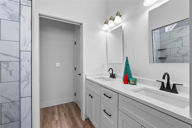 bathroom featuring vanity and hardwood / wood-style flooring