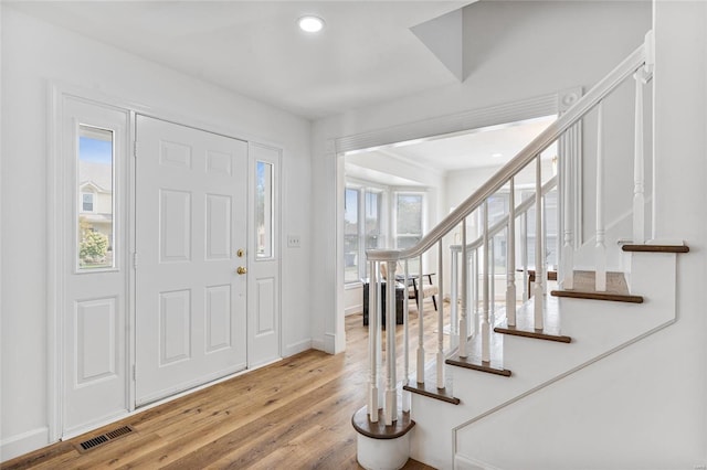 foyer entrance featuring light hardwood / wood-style floors