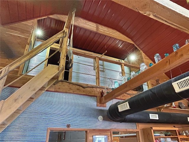 interior space featuring beamed ceiling