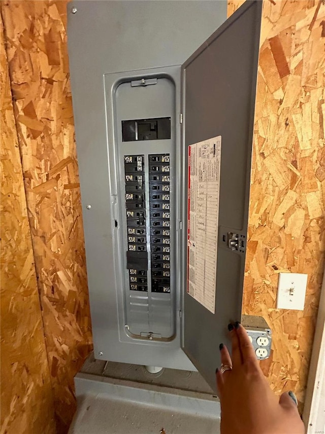 utility room featuring electric panel