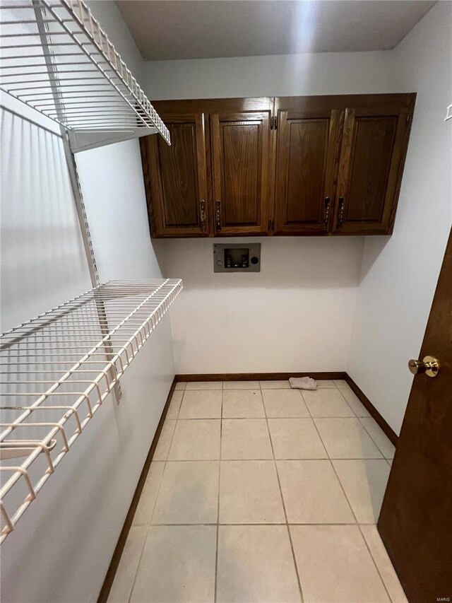 walk in closet featuring light tile patterned floors